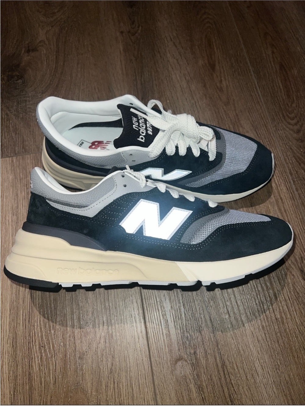 New Balance Woman’s Sneakers in Black, Gray, and White